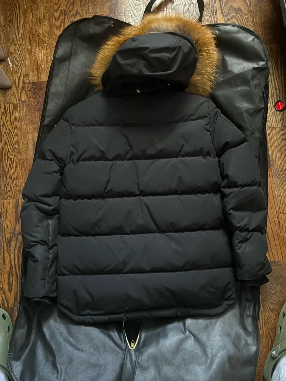 Moose Knuckles Black Winter Jacket with Gold Fur Trim And Accents